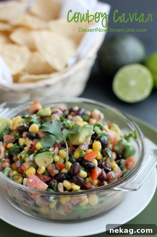 Cowboy Caviar Recipe with Video Tutorial 5 Cowboy Caviar is a chunky salsa-type dip with beans, avocado, tomatoes, corn and a zesty dressing. Great for picnics, potlucks, parties, or a game day snack!