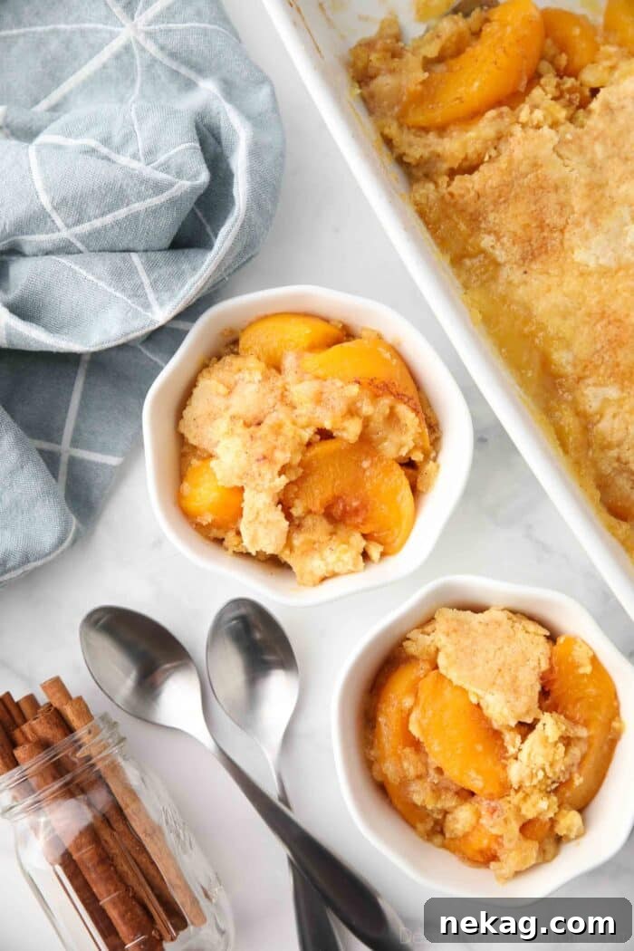 Top view of bowls full of peach dump cake (aka peach cobbler with cake mix).