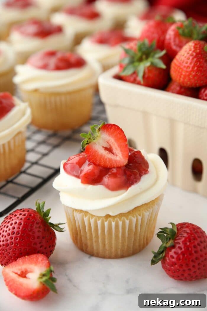 Strawberry Shortcake Cupcakes Recipe — Moist Strawberry Cupcakes 11 Valentine's Day Cupcakes with vanilla cake, whipped cream frosting, and fresh strawberry sauce.