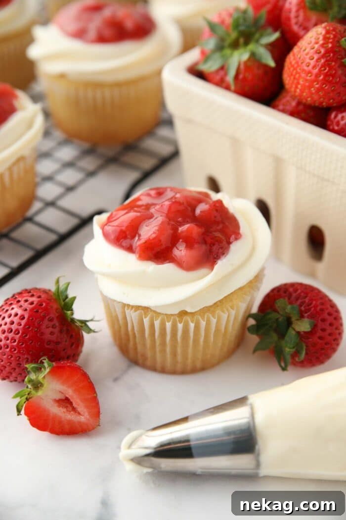 Strawberry Shortcake Cupcakes Recipe — Moist Strawberry Cupcakes 3 Valentine cupcakes made with strawberry sauce, whipped cream cheese frosting, and vanilla cake.