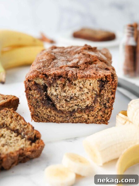 View of a cinnamon swirl center inside banana bread.