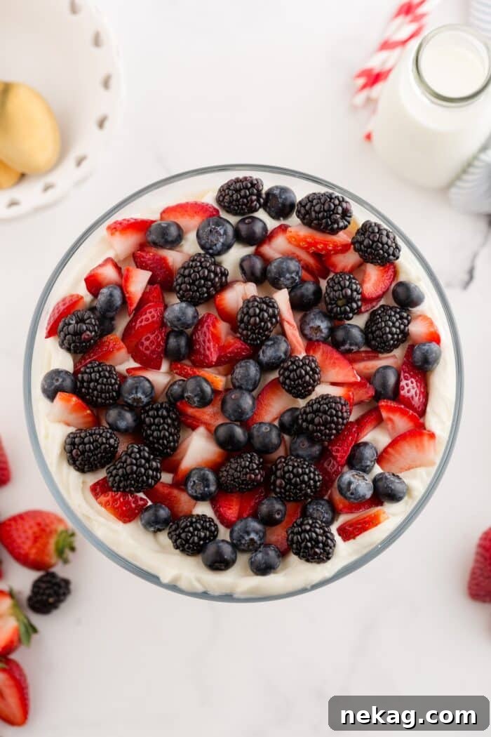 Red, White & Blue Berry Trifle Recipe with How-To Video 7 Topping 4th of July trifle with red and blue berries.