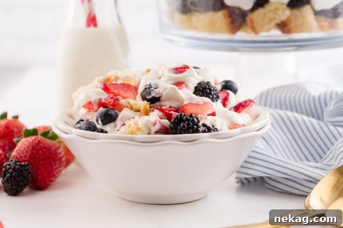 Red, White & Blue Berry Trifle Recipe with How-To Video 10 4th of July trifle scooped into a bowl.