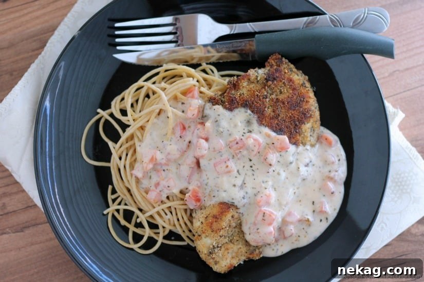 Herb Crusted Chicken with Tomato Cream Sauce