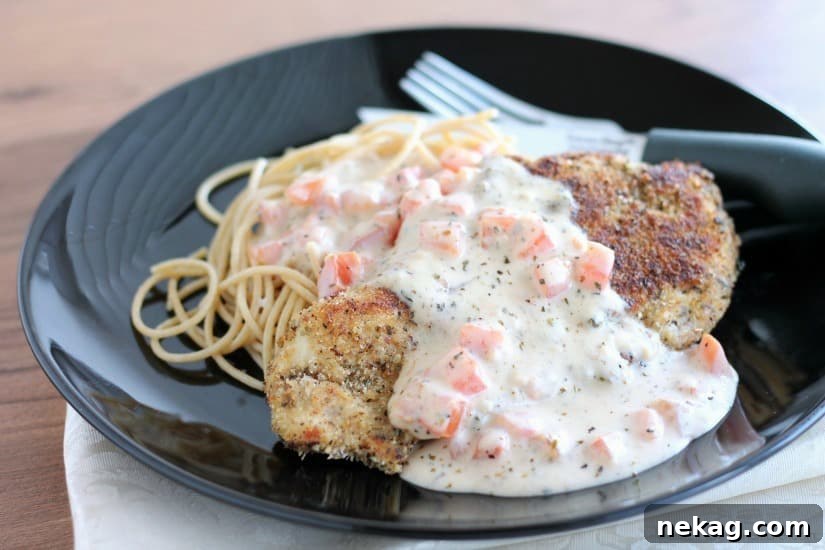 Herb Crusted Chicken with Tomato Cream Sauce