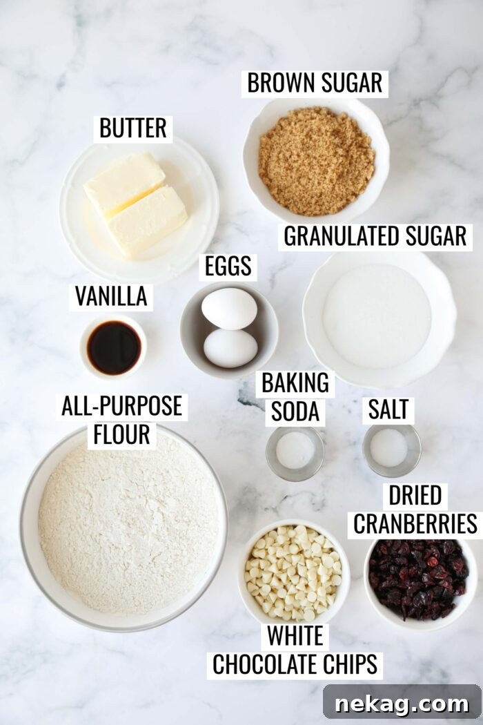 Labeled ingredients needed to make White Chocolate Cranberry Cookies.