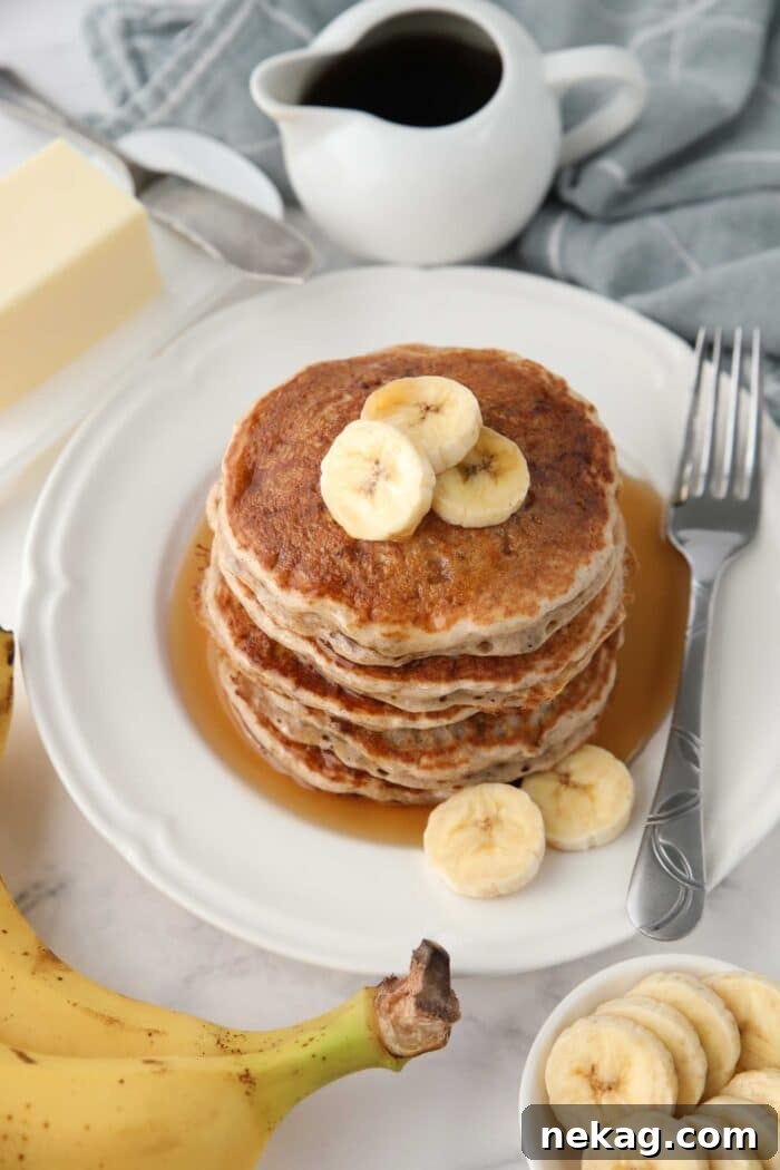 Fluffy 4-Ingredient Banana Pancakes Without Eggs 3 Stack of quick and easy banana pancakes made with a mix.