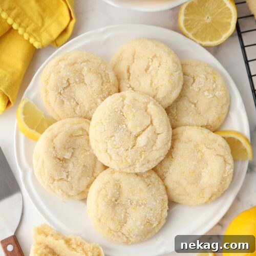 Lemon Cookies on a plate made like sugar cookies with lemon zest.