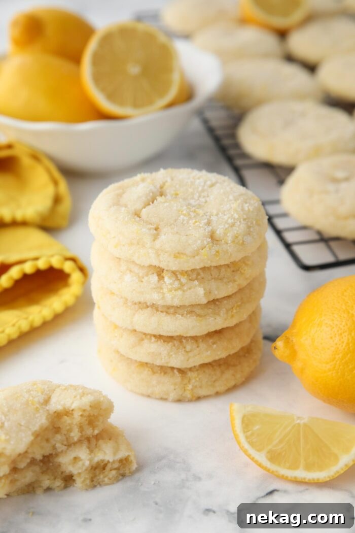 Stack of Lemon Cookies with lemon zested sugar on the outside.