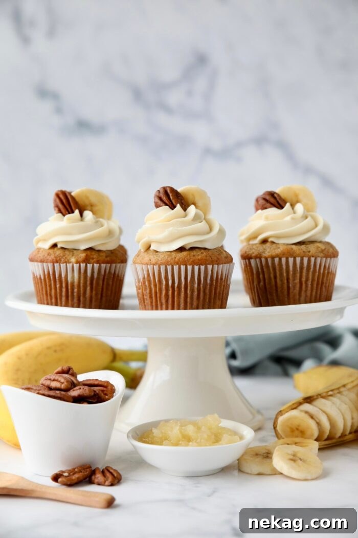 Southern-Style Hummingbird Cupcakes with Cream Cheese Frosting 3 Hummingbird Cupcakes made with bananas, pineapple, and pecans and topped with cream cheese frosting.