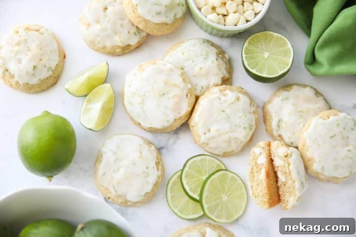 Key Lime Cookies with white chocolate chips topped with a lime glaze.