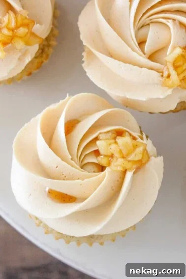 Caramel Apple Cupcakes on marble cake stand.