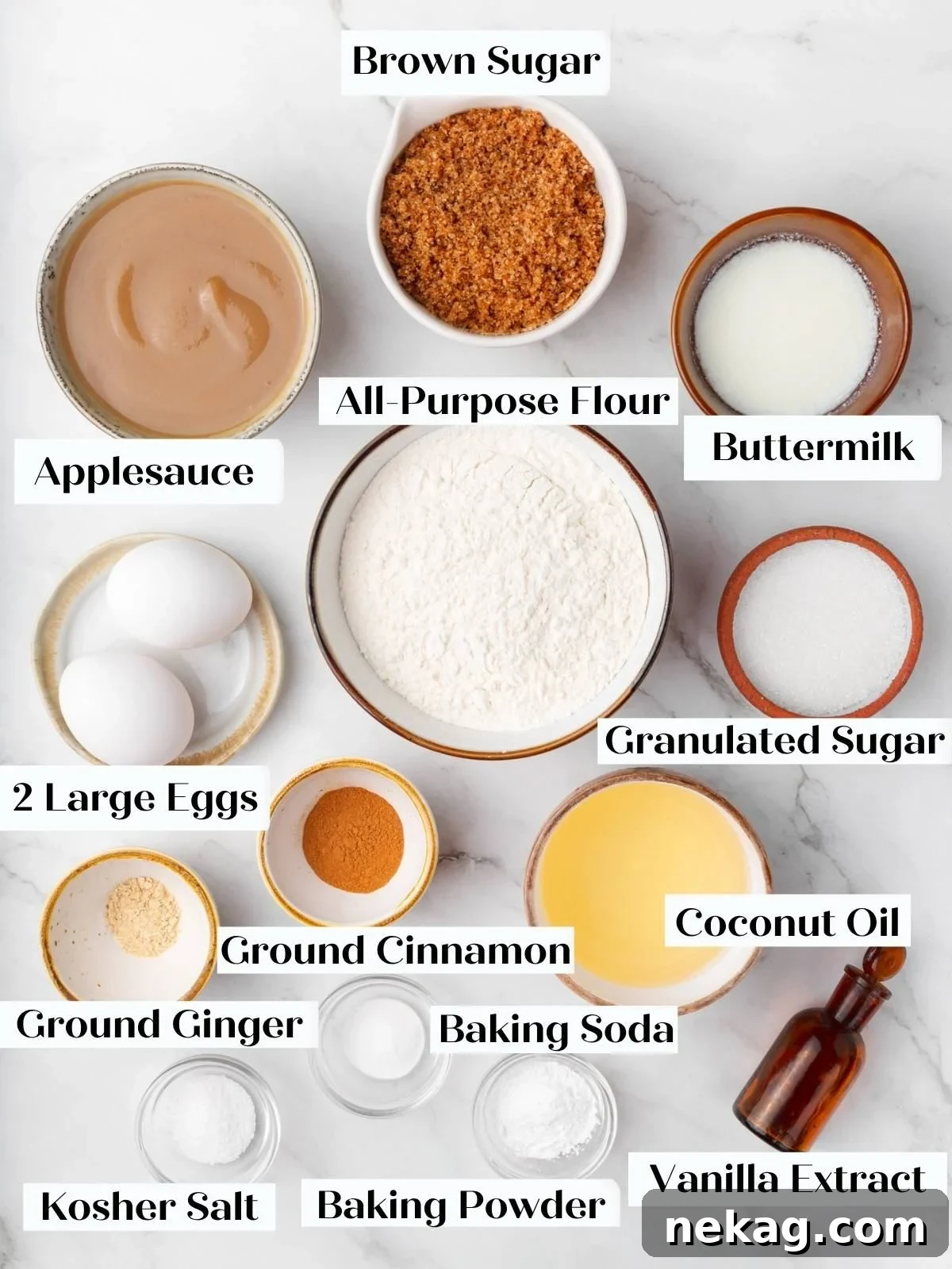 Moist Homemade Applesauce Bread Recipe 4 Labeled bowls of applesauce, brown sugar, buttermilk, flour, eggs, sugar, spices, coconut oil, and vanilla.