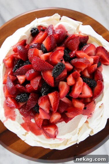 The best pavlova dessert with lemon curd fresh fruit.