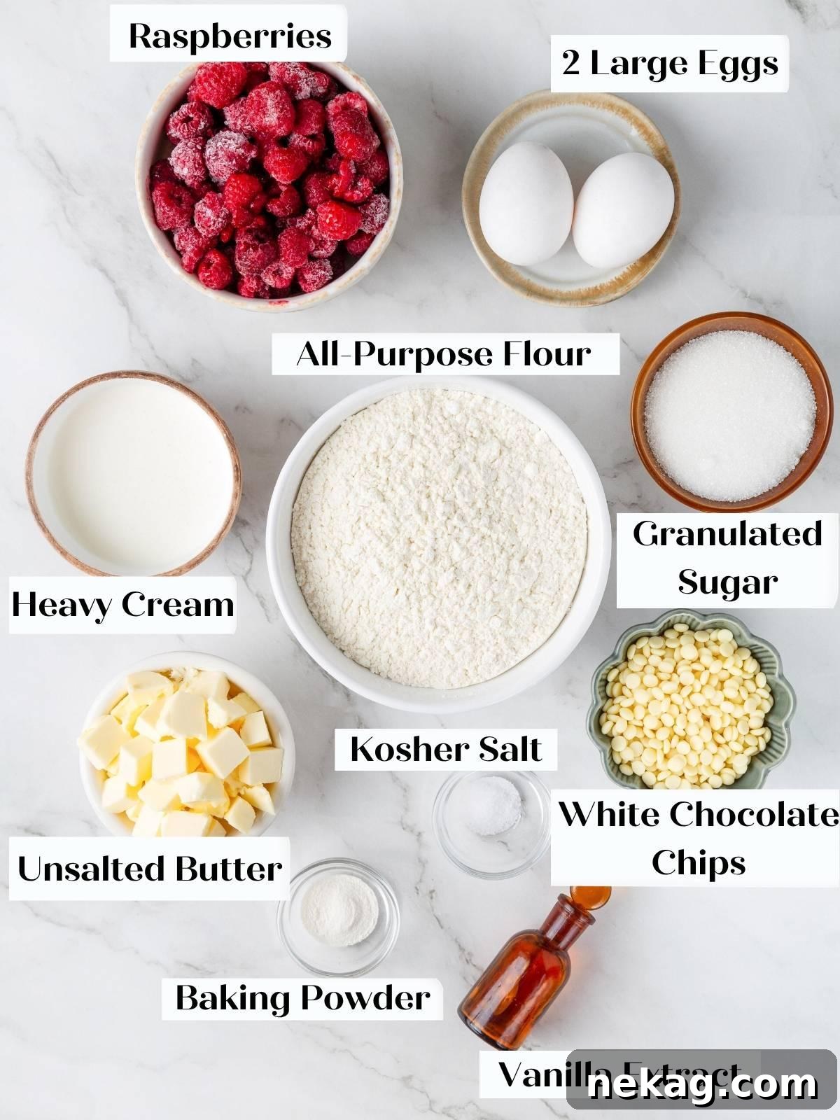 Labeled bowls of raspberries, eggs, flour, sugar, butter, cream, white chocolate chips, baking powder, salt, vanilla.