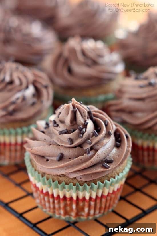  Pumpkin Cupcakes with Nutella Frosting from DessertNowDinnerLater.com