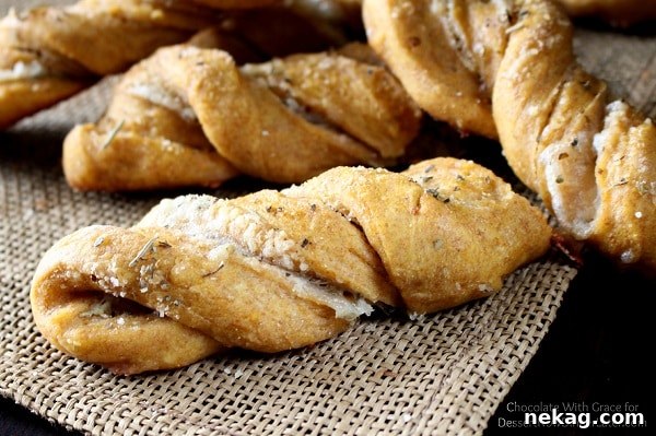 Savory Pumpkin Twists - Soft, moist yeast rolls featuring savory pumpkin flavors