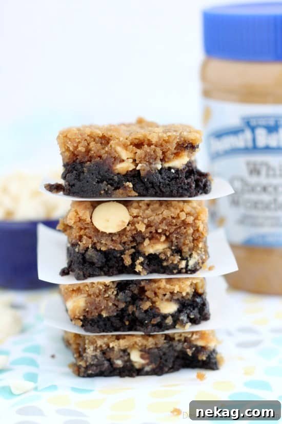 White Chocolate Peanut Butter Brookies: Gooey Brookie Recipe 5 White Chocolate Peanut Butter Brookies - a layer of brownies topped with a layer of peanut butter white chocolate chip cookies. Combined they are delicious brookies! From DessertNowDinnerLater.com