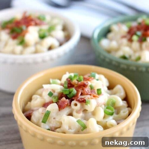This White Cheddar Bacon Mac and Cheese will become your favorite comfort food with tender elbow macaroni, creamy white cheddar sauce, and bits of bacon throughout! From DessertNowDinnerLater.com