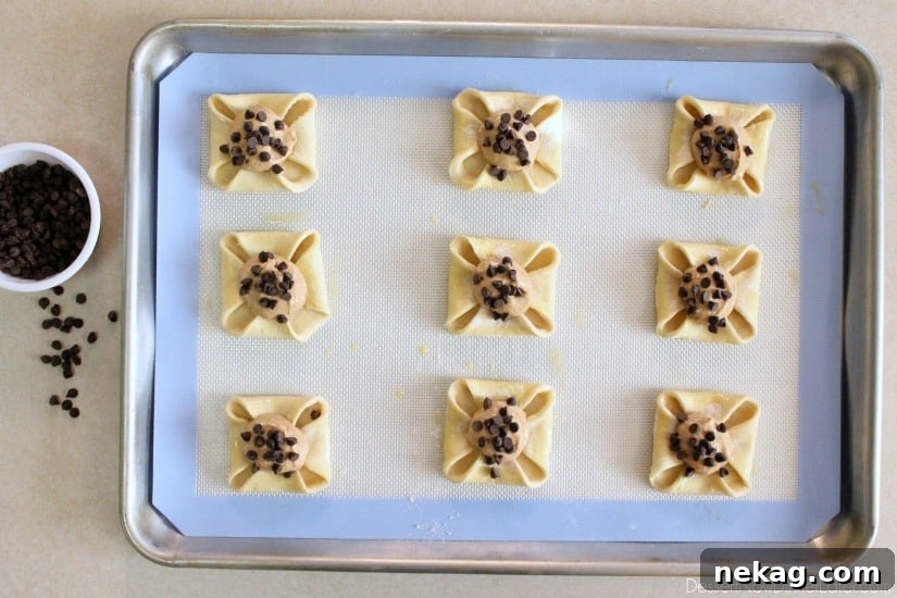 Pumpkin Chocolate Chip Pastries Recipe for Fall Baking Delight 5 Pumpkin Chocolate Chip Pastries - step 3 - add spiced pumpkin filling and mini chocolate chips