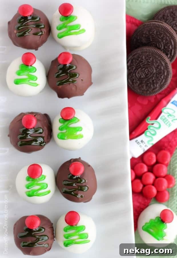 These traditionally made OREO Cookie Balls are decorated with green gel and a red candy coated chocolate piece for a festive Christmas Tree treat! From DessertNowDinnerLater.com