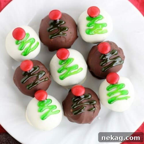 These traditionally made OREO Cookie Balls are decorated with green gel and a red candy coated chocolate piece for a festive Christmas Tree treat! From DessertNowDinnerLater.com