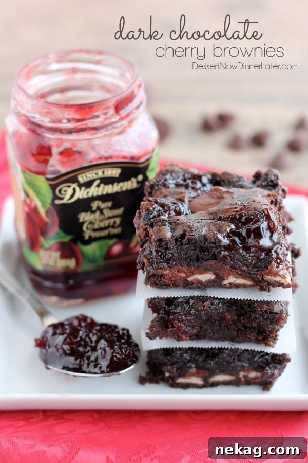 Decadent Dark Chocolate Cherry Brownies Recipe 2 Dark Chocolate Cherry Brownies are made from a doctored box mix that has cherry filled morsels and cherry preserves swirled throughout. From DessertNowDinnerLater.com