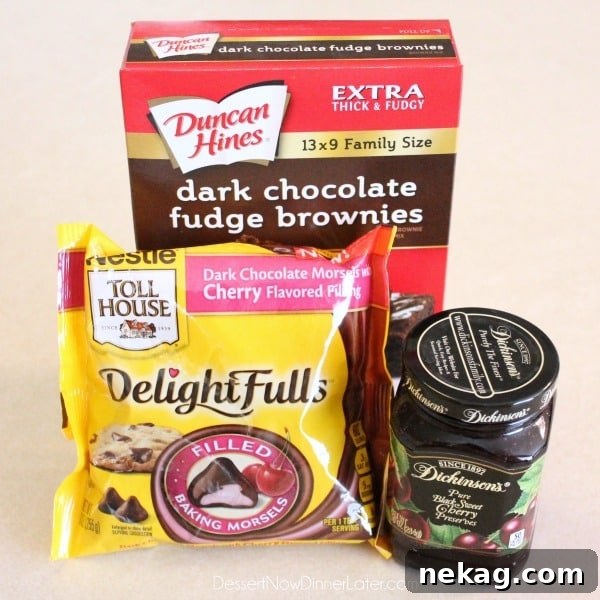 Decadent Dark Chocolate Cherry Brownies Recipe 4 Dark Chocolate Cherry Brownies are made from a doctored box mix that has cherry filled morsels and cherry preserves swirled throughout. From DessertNowDinnerLater.com