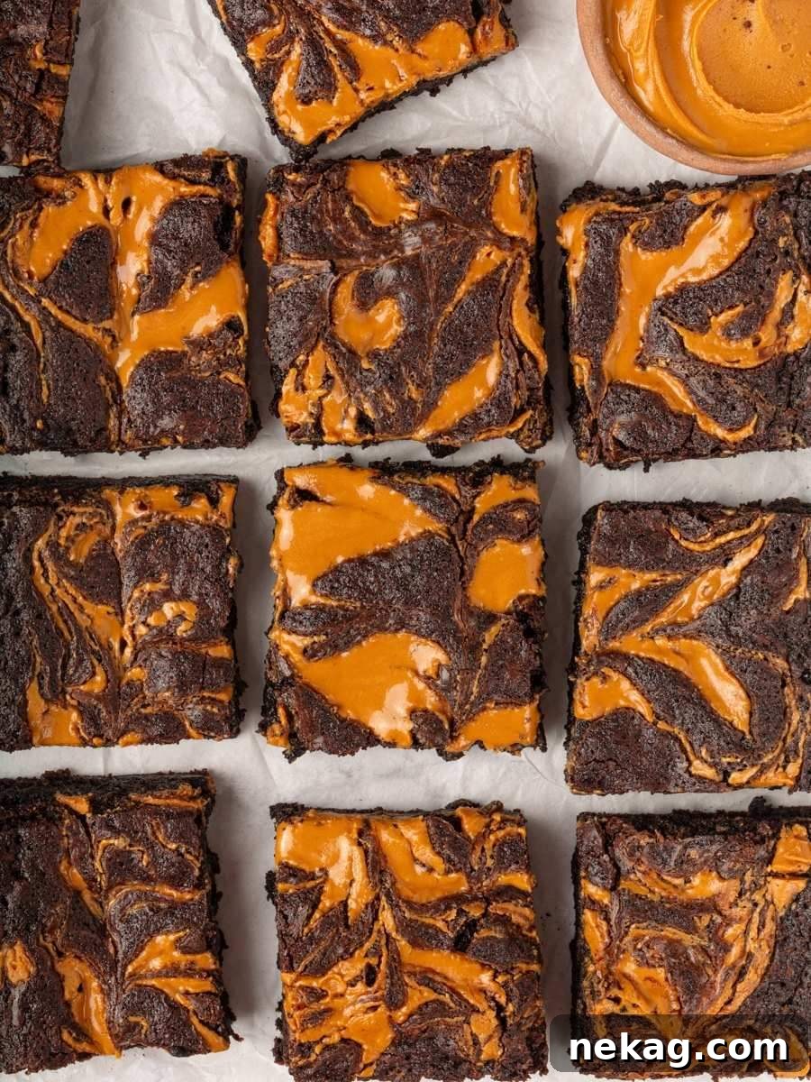 Viewed from above, the grid shows consistent swirls that make these peanut butter brownies look bakery-perfect.