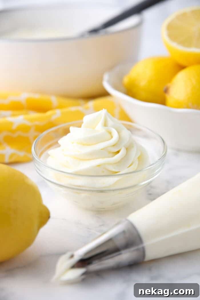 Lemon buttercream frosting piped into a small bowl.