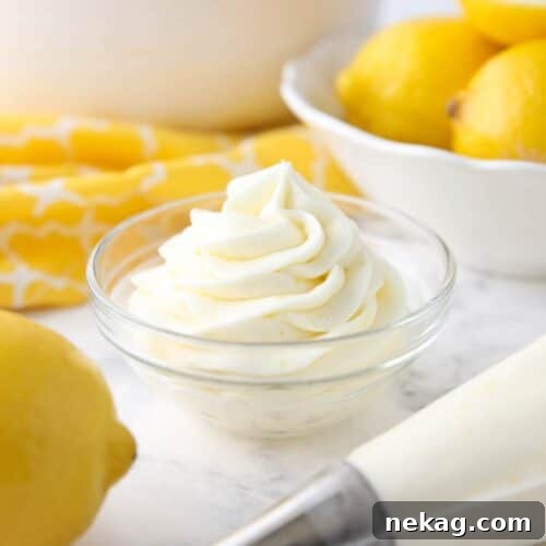 Lemon buttercream frosting piped into a small bowl.