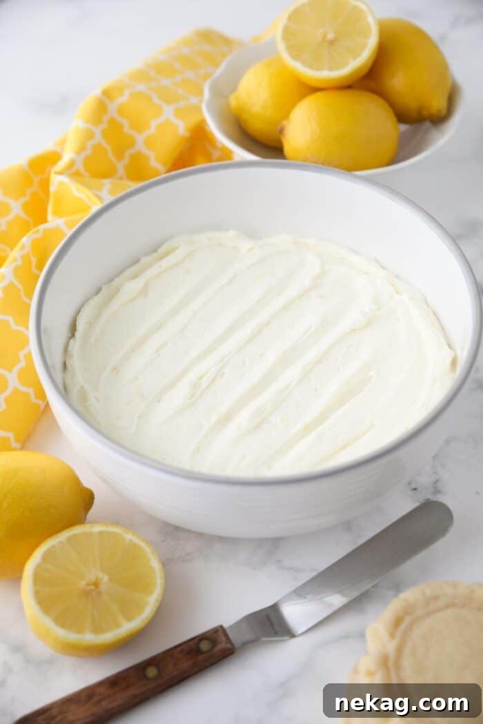Lemon frosting in a large bowl.