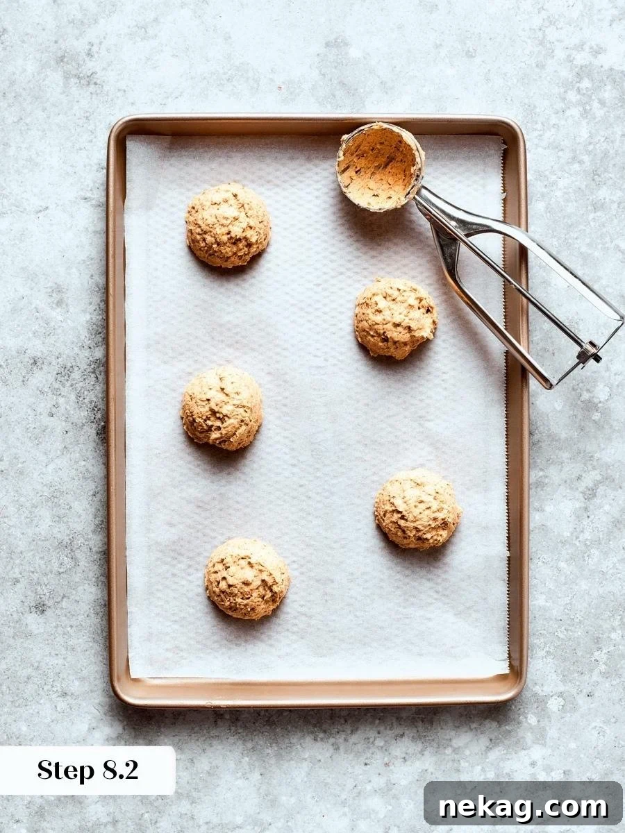 Portioning at an even size ensures each oatmeal cream pie cookie bakes and spreads exactly alike.