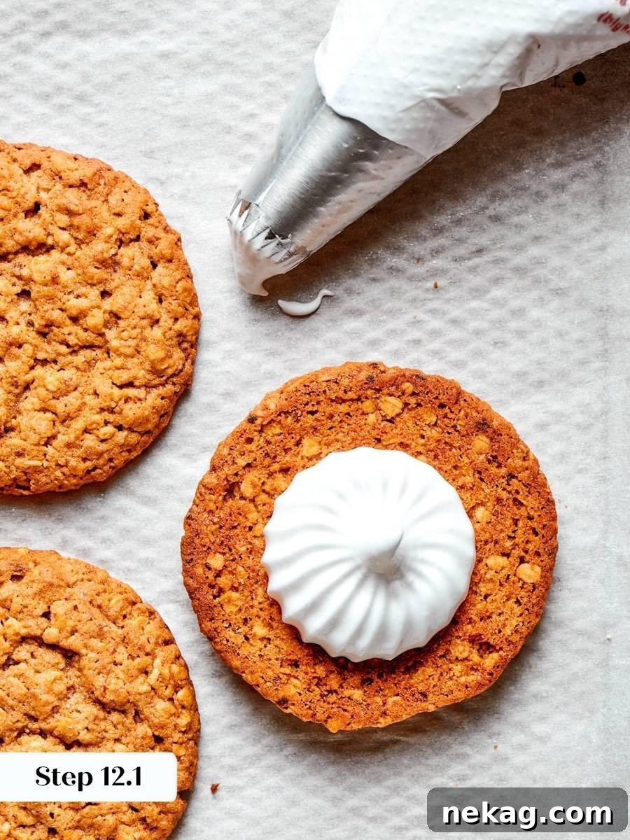 Piping the fluff with a clean border keeps the oatmeal cream pie filling from squeezing out.