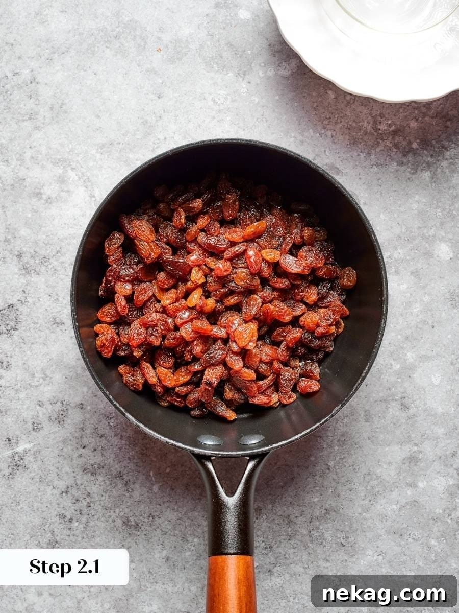 Softening the raisins is the first step toward the paste that keeps oatmeal cream pies chewy.