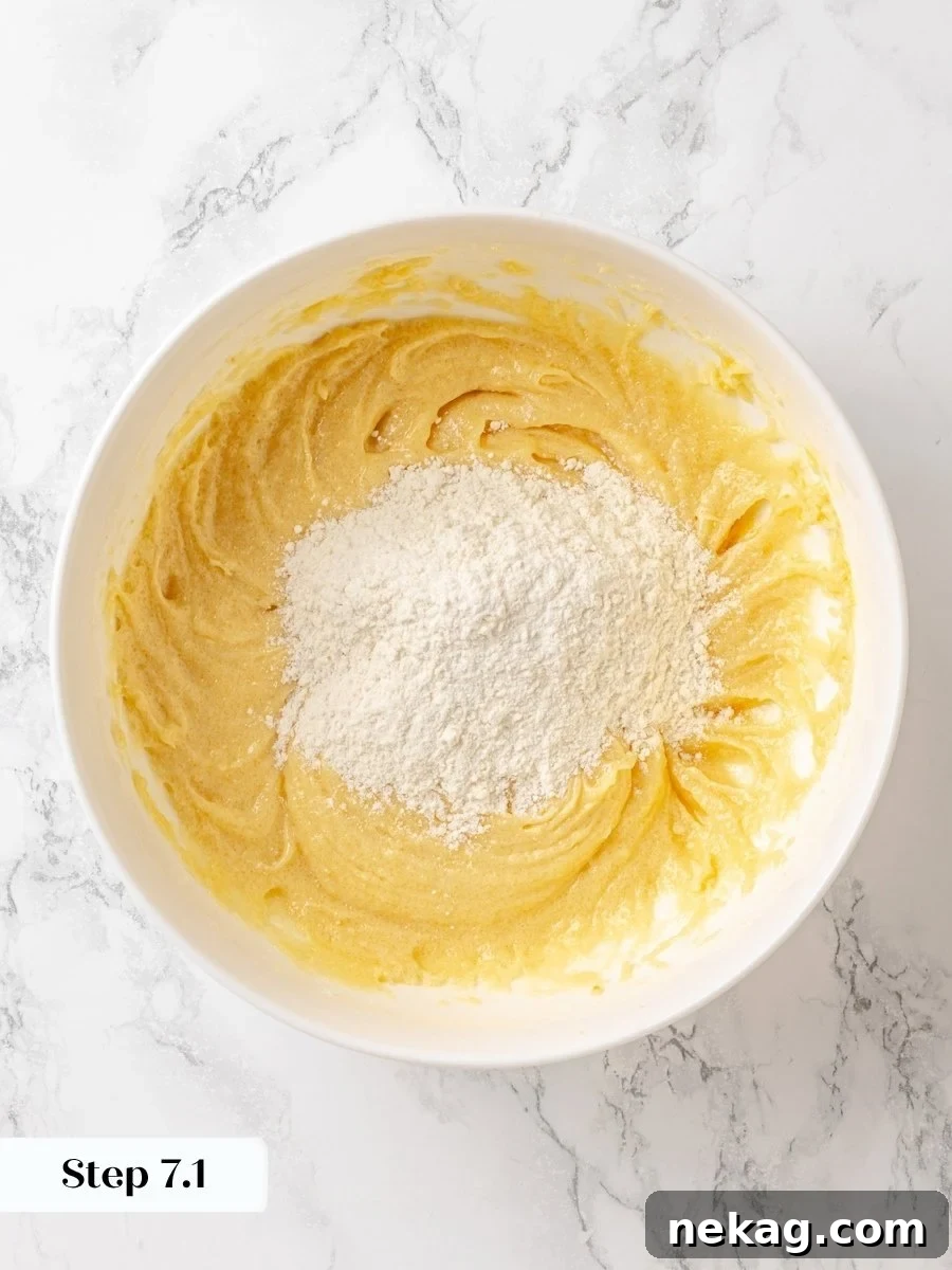 Starting with flour protects the crumb cake from overmixing, which would toughen the finished slice.