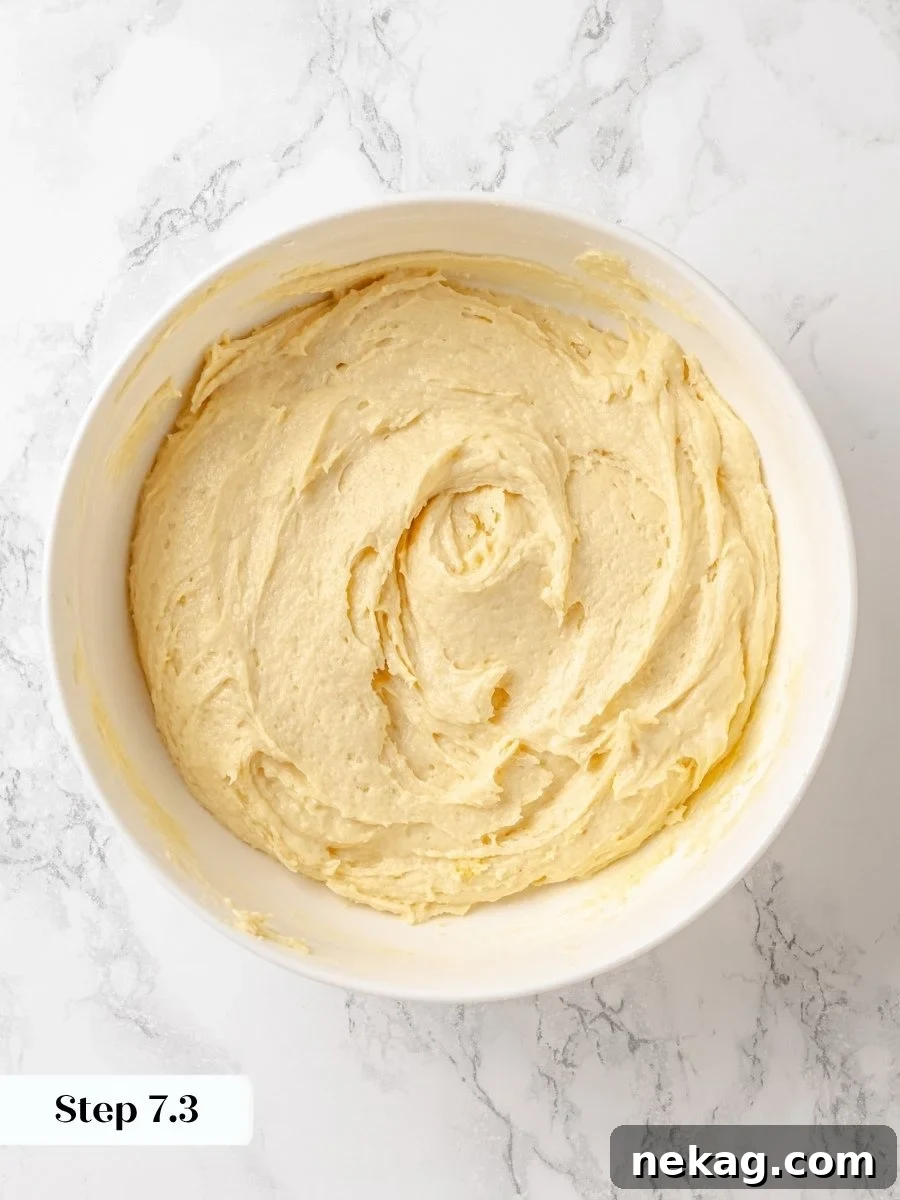 Stopping the mixing here leaves the crumb cake batter thick enough to support the topping above.