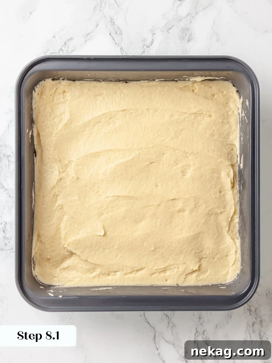 An even layer matters here because the crumb cake topping will not settle into low spots.