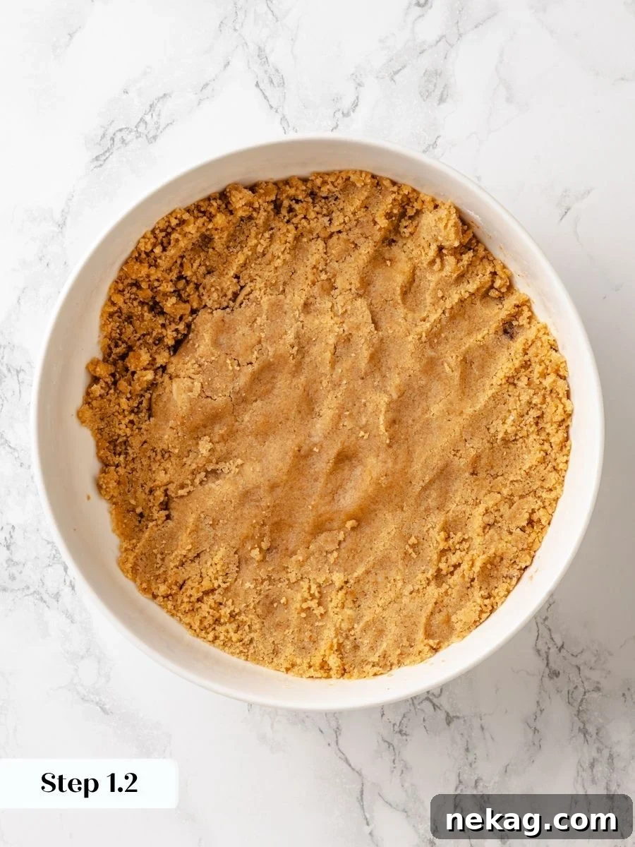 Pressing and chilling the mixture is what lets crumb cake topping break into big irregular chunks.