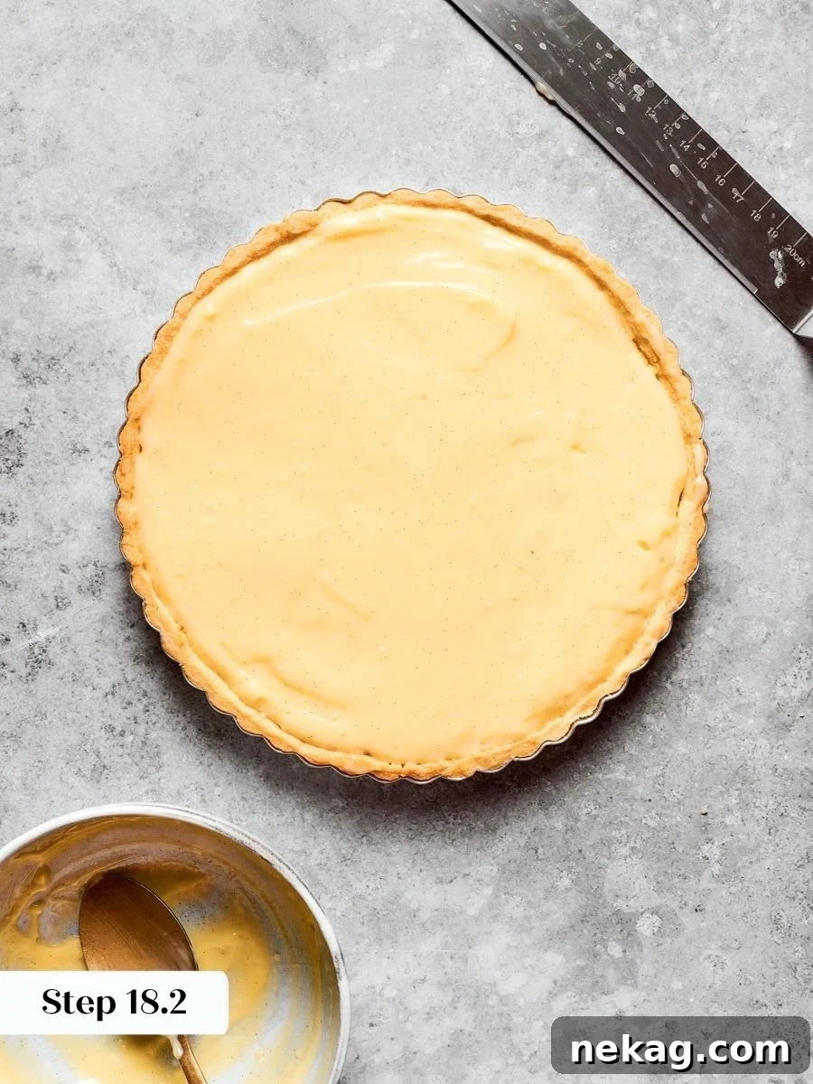Classic Fresh Fruit Tart with Vanilla Pastry Cream 9 An even layer supports the fruit that follows without any dip across the fruit tart.