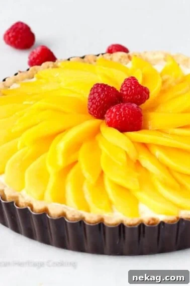 Classic Fresh Fruit Tart with Vanilla Pastry Cream 11 Coconut Mango Tart with sliced mango topping.