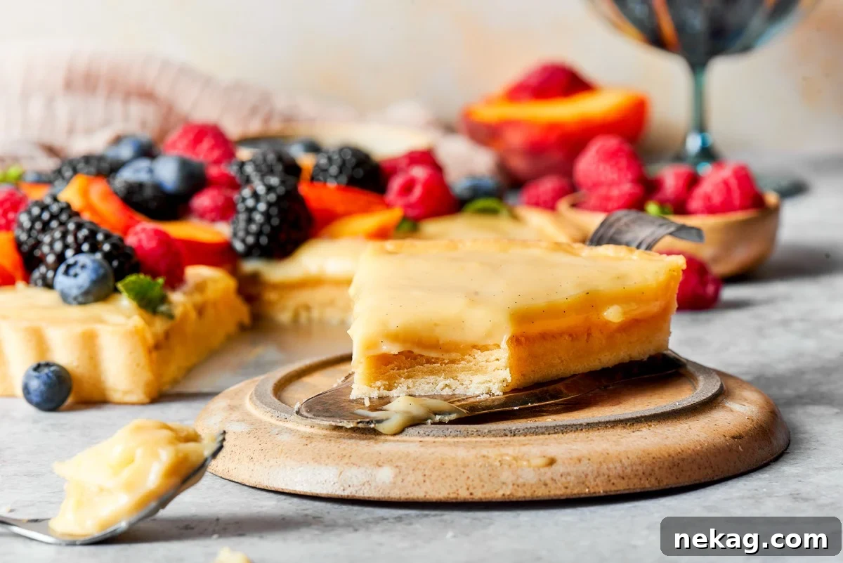 Classic Fresh Fruit Tart with Vanilla Pastry Cream 7 Carrying both the whole tart and a layered slice, this fruit tart frame works wide.