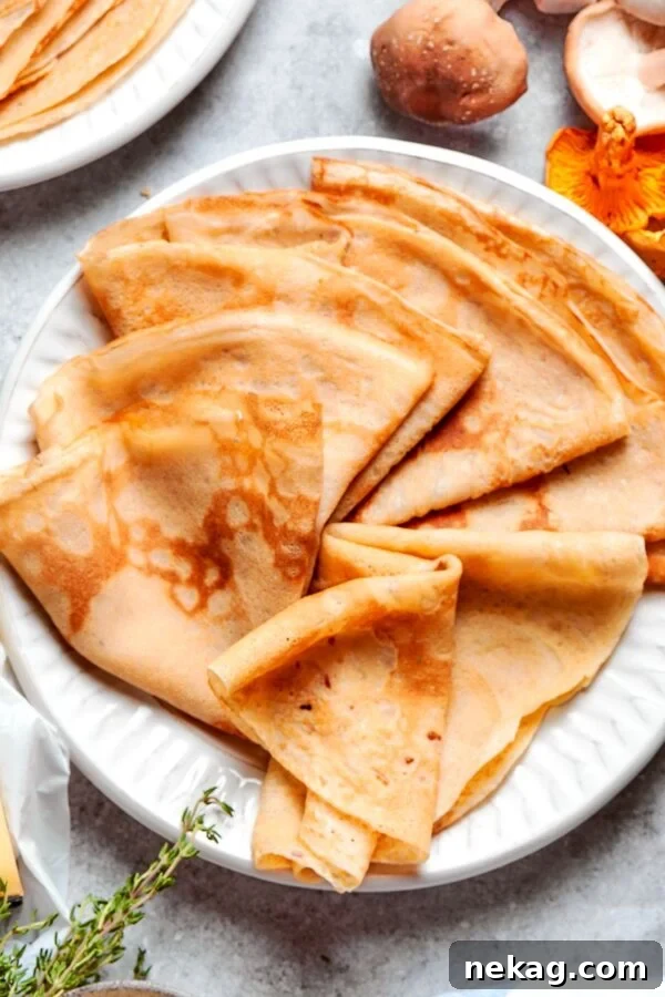 Sturdy enough for hearty fillings, buckwheat crepes hold sauteed mushrooms without tearing at the fold.