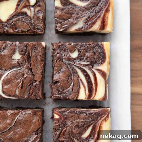 Fudgy Cheesecake Brownies Recipe 10 Close up of swirls in cheesecake brownies.